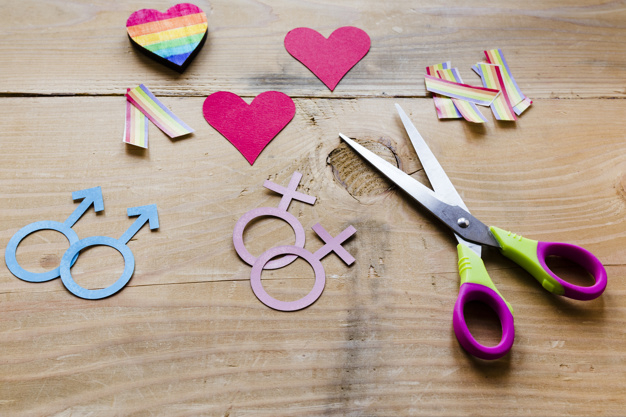 closeup,rainbows,homosexual,arrangement,multicolored,lesbian,small,rights,lgbt,orientation,composition,equality,tolerance,two,pride,liberty,horizontal,couples,diversity,gay,relationship,male,gender,top view,top,bright,beautiful,view,wooden background,together,female,freedom,identity,wooden,hearts,community,symbol,scissors,shape,sign,couple,colorful,rainbow,icons,flag,red,table,paper,icon,design,love,heart,background