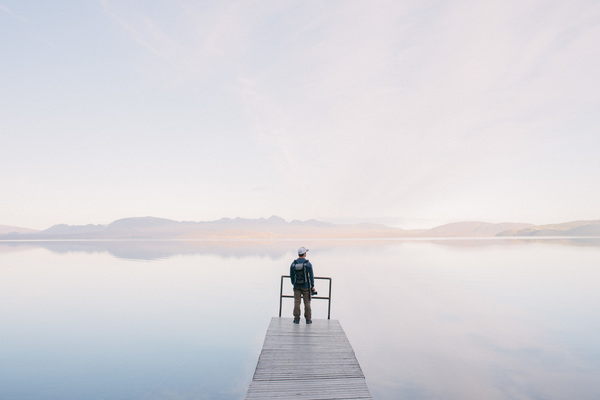 beach,calm,calm waters,camera,dawn,dock,dusk,fog,foggy,glass,jetty,lake,landscape,man,mist,morning light,mountain,natural,nature,ocean,outdoors,person,photographer,placid,reflection,scenic,sea,sky,standing,sunset,tranquil,travel,water,wear,wide,Free Stock Photo