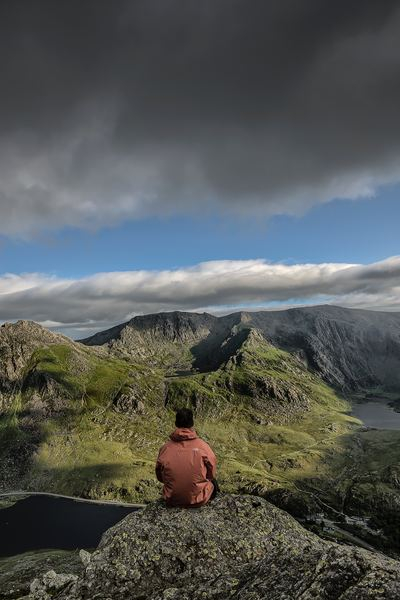 soul,eye,portrait,cliff-sitting,sitting,sit,back,man,forest,man,wanderlust,outdoors,hike,summit,view,looking out,cloud,mountain,scenery,person,looking away,free stock photos