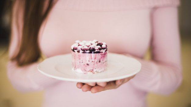 food,people,hand,woman,cake,blue,fruit,human,white,person,breakfast,round,sweet,plate,dessert,show,lady,nutrition,cream,female,fresh,snack,holding hands,up,berry,close,blueberry,delicious,cuisine,holding,adult,ceramic,taste,yummy,hold,tasty,homemade,appetizer,still,creamy,calorie,topping,showing,freshness,temptation,closeup,selective,tempting,midsection