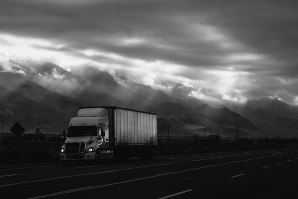 road,truck,van,vehicle,travel,trip,mountain,highland,landscape,sky,clouds,transmission,line