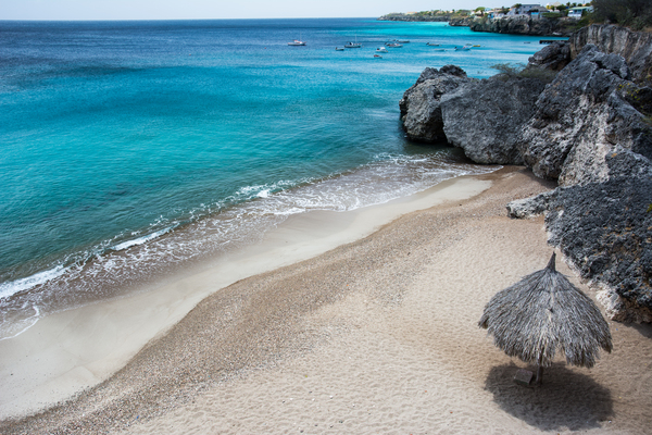 beach,sand,water,ocean,sea,tropical,caribbean,paradise,coast,rocks,umbrella,boats