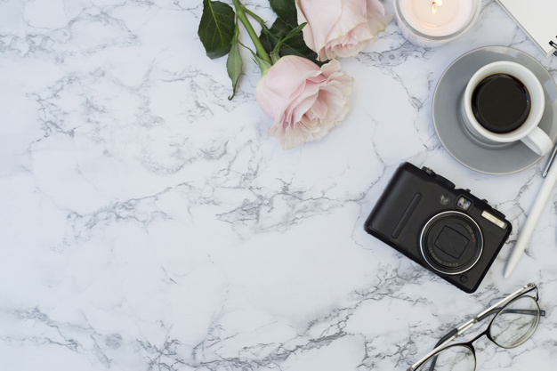 flower,coffee,camera,office,table,work,glasses,notebook,roses,pen,coffee cup,job,desk,worker,cup,candle,marble,date,romantic,workspace