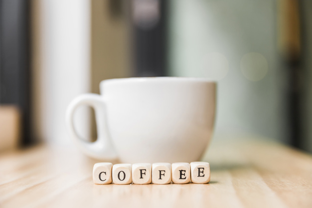 coffee,wood,restaurant,table,shop,text,letter,shape,coffee cup,desk,cup,breakfast,cube,mug,wooden,coffee shop,wood table,simple,fresh