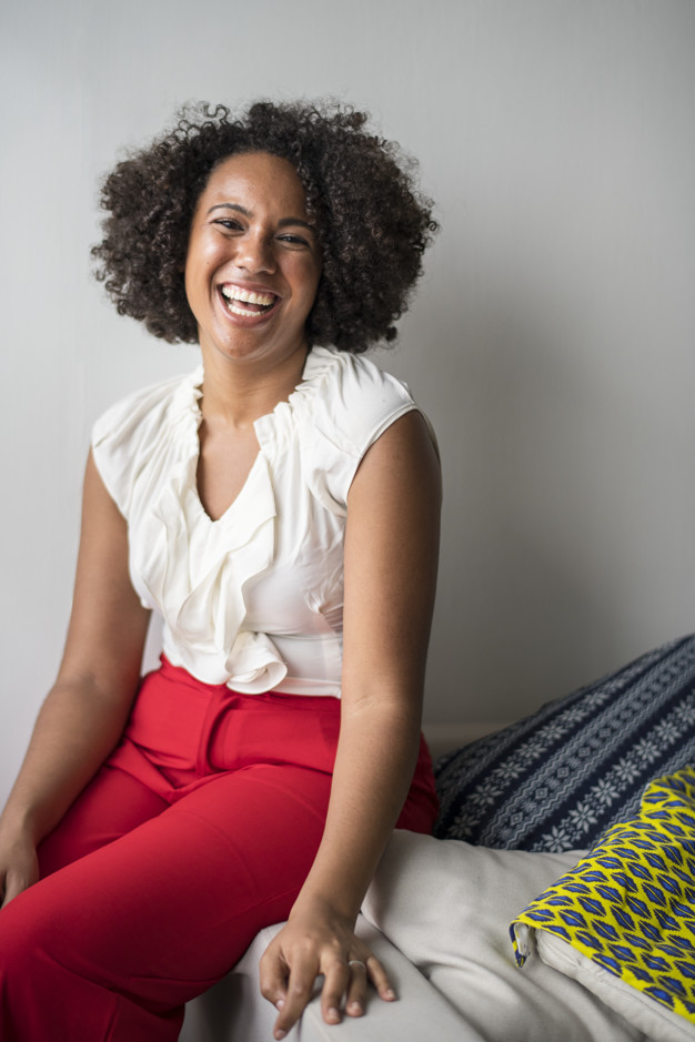 hair,home,black,happy,colorful,african,happiness,beautiful,bright,woman hair,american,couch,break,joy,afro,comedy,adult,laughing,big,gorgeous