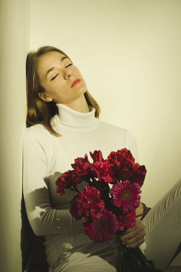 pensive,indoors,thoughtful,closed eyes,blond,bunch,serious,gerbera,casual,dreaming,carnation,calm,pretty,holding,different,closed,spring flowers,woman hair,beauty woman,bright,sitting,beautiful,pink flower,fresh,young,bouquet,female,romantic,sad,branch,cute background,light background,model,nature background,natural,eyes,flower background,plant,pink background,white,clothes,room,wall,white background,spring,cute,red background,hair,red,pink,light,woman,flowers,flower,background
