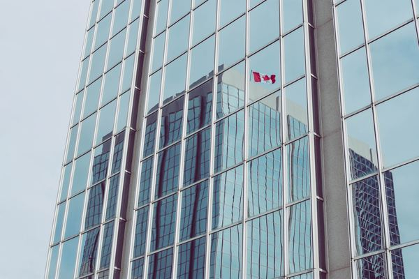 canada,team,teamwork,reflection,lake,outdoor,woman,girl,lady,window,reflection,canadian flag,mirrored,facade,building,pattern,corporate,old,interior,town,correctional institution