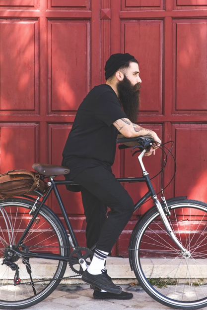 fashionable,length,riding,side,full,casual,handsome,leisure,outdoors,stylish,one,cyclist,adult,sunlight,sunny,guy,male,day,lifestyle,vehicle,cycling,young,urban,cycle,transportation,youth,creativity,life,beard,transport,modern,person,bicycle,bag,backdrop,bike,tattoo,art,red,sport,man,fashion,city,people,background