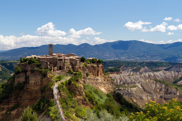 civita,bagnoregio,landscape,building,architecture,architectonic,architectural,medieval,edifice,residential,viewpoint,overlook,valley,rock,scenery,mountain,scenic,panorama,panoramic,rocky,urban,urbanistic,house,century,bridge,ancient,village,viterbo,volcanic,tuff,monumental,monument,etruscan,etrurian,city,dying,town,facade,perspective,view,sight,tourism,tourist,outdoor,exterior,outside,lazio,italy,blue,sky