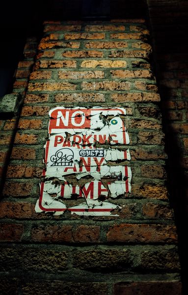 other,dromedary,shadow,misc,wheel,plane,statement,sign,light,sign,alleyway,urban,city,brick,downtown,no parking,ripped,grunge,allyway,ally,dark,free images