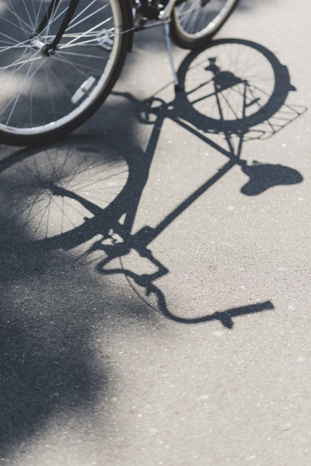 sport,road,bike,metal,gear,silver,bicycle,new,street,transport,wheel,chain,tire,shadow,stand,balance,transportation,cycle,outdoor,steel