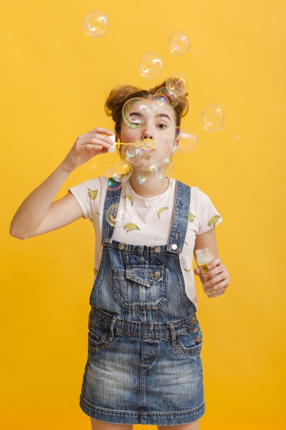 yellow day,high angle,pose,high,indoor,vertical,showroom,pretty,angle,teen,day,beautiful,happiness,young,youth,studio,model,bubbles,teenager,yellow,girl
