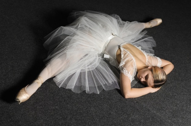 Young Woman Performing Ballet Pose #1 by Pm Images