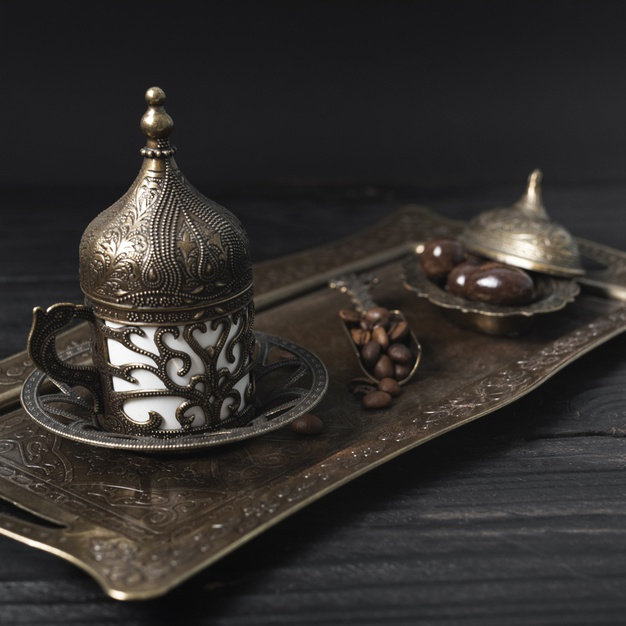 high angle,squared,caffeine,defocused,high,tray,angle,turkish,beans,beverage,teapot,textile,hot,cloth,coffee beans,spoon,fabric,plate,cup,drink,silver,candy,chocolate,coffee