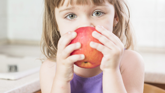 food,people,hand,kitchen,hair,beauty,red,fruit,health,cute,eye,kid,child,human,apple,person,organic,healthy,eat,healthy food