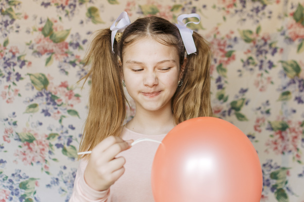ribbon,people,hand,girl,pink,wallpaper,cute,smile,kid,balloon,child,person,eyes,fun,fork,life,grey,stand,female,young,pop,pink ribbon,burst,holding hands,portrait,up,problem,cute girl,lifestyle,fragile,look,pretty,childhood,hold,front,casual,trouble,blonde,small,little,ponytail,destruction,waist,innocent,breakdown,adorable,closeup,selective,indoors,popping,innocence,mischief,waist up,with