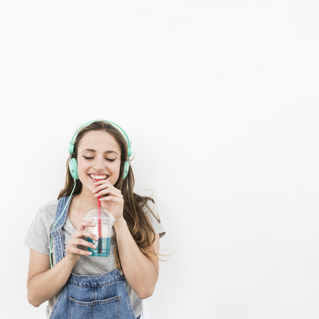 background,music,people,woman,girl,space,smile,happy,white background,person,backdrop,white,glass,drink,eyes,juice,cocktail,music background,studio,female,young,transparent,happy people,liquid,headphone,background white,happiness,portrait,listen,straw,joy,beverage,drinking,closed,enjoy,hobby,refresh,holding,adult,listening,copy,smiling,front,teenage,casual,refreshment,enjoying,closeup,lifestyles,waistup