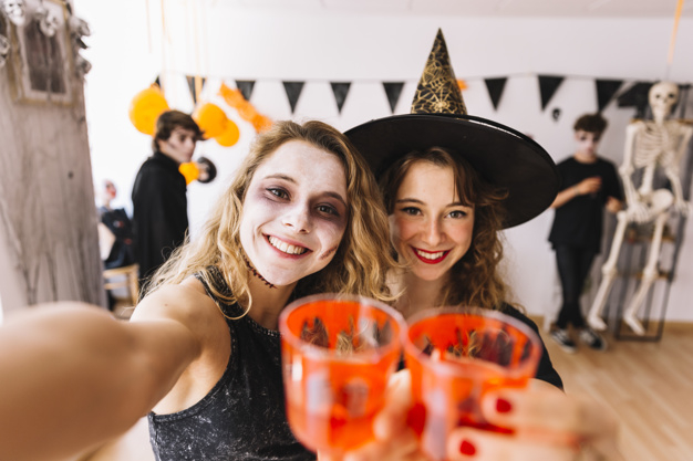 party,halloween,camera,red,autumn,space,celebration,orange,black,decoration,glass,drink,fall,selfie,zombie,young,witch,skeleton,masquerade,season