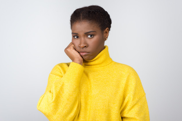 turtleneck,unpleasant,unsuccessful,unfortunate,gesturing,front view,disappointed,chin,failed,posing,upset,facial expression,knitted,emotional,worried,casual,unhappy,african american,front,standing,pretty,adult,poor,facial,gesture,american,arm,portrait,expression,beautiful,view,sweater,emotion,young,female,african,person,woman,hand
