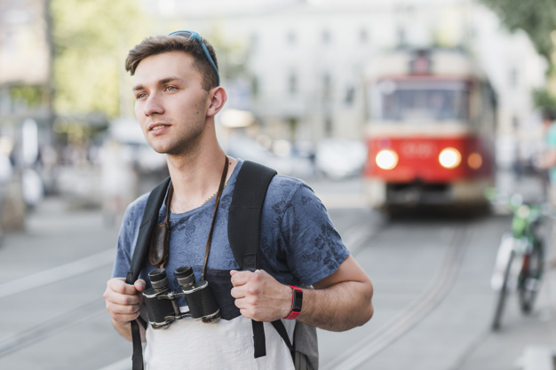 city,man,beauty,holiday,location,street,adventure,walking,youth,trip,urban,female,young,way,backpack,tour,weekend,tourist,binoculars,route