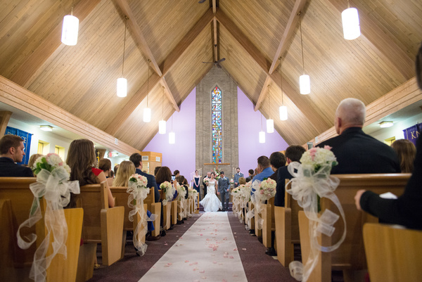 aisle,bride,celebration,ceremony,church,couple,groom,guests,indoors,man,people,weding,woman
