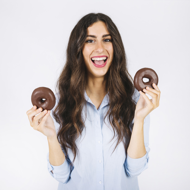 food,face,smile,sweet,eat,donut,female,young,good,donuts,delicious,laughing,smiling,looking,tasty,joyful,good looking,with
