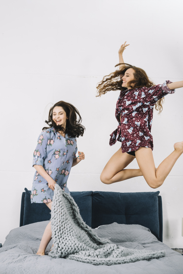 pattern,floral,people,house,woman,fashion,home,beauty,floral pattern,smile,happy,friends,bed,fun,funny,model,youth,bedroom,female,young,happy people,jump,happiness,fashion model,beauty woman,jumping,motion,cheer,blanket,holding,adult,pretty,stylish,smiling,two,hold,casual,cheerful,bonding,fashionable,enjoying,closeup,indoors,midair