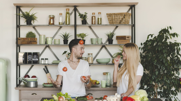 people,hand,man,kitchen,hair,beauty,red,smile,happy,room,couple,plant,organic,beard,vegetable,tomato,female,young,happy people,holding hands