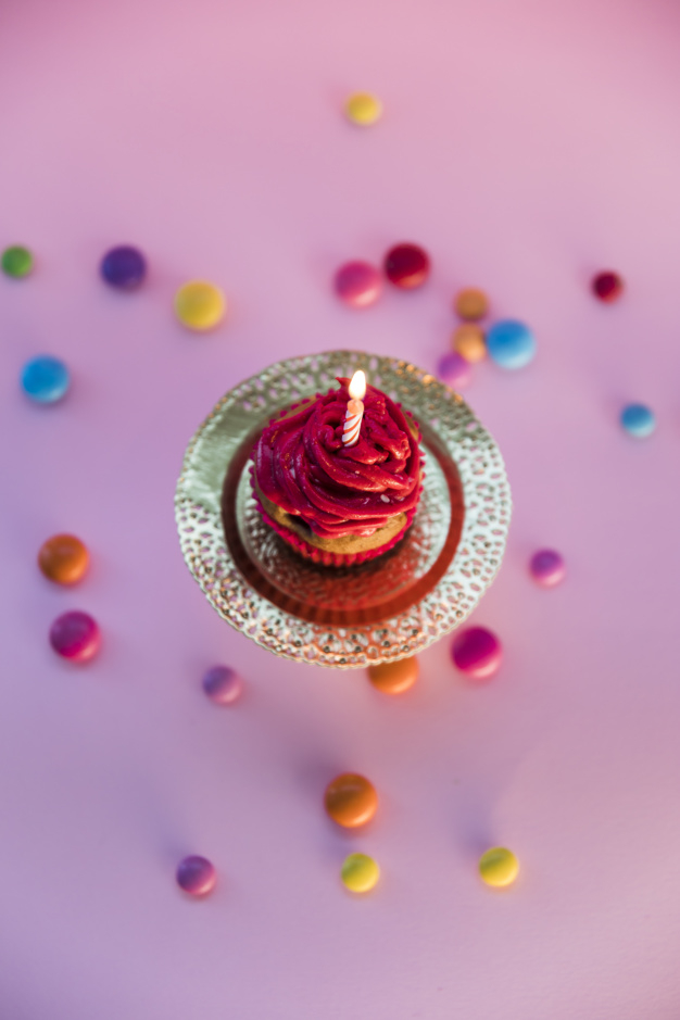 background,food,birthday,party,light,cake,pink,red,celebration,candy,colorful,cupcake,backdrop,pink background,colorful background,decoration,flame,candle,birthday cake,sweet