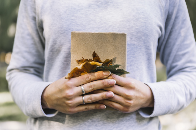 book,hands,autumn,leaves,study,fall,knowledge,learn,autumn leaves,view,imagination,holding hands,read,holding,discover,hold,front,know,feelings,front view