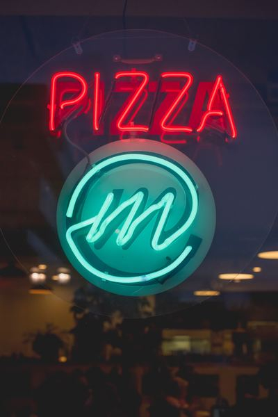 neon,light,sign,word,letter,sign,pizza,food,table,sign,pizza,neon,window,restaurant,cafe,fast food,urban,city,outdoors,design,typography