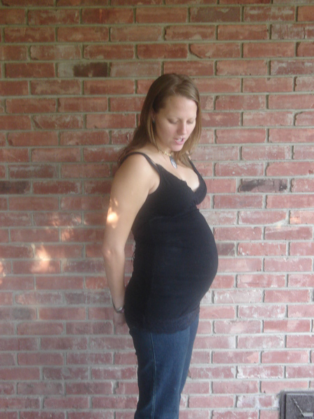woman,mother,maternal,pregnant,pregnancy,expecting,expectant,maternity,brick,bricks,wall