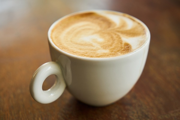 wood,white,table,porcelain,milk,liquid,latte art,latte,foam,cup of coffee,cup,coffee drink,coffee cup,coffee,close-up,caffeine,café,brown,blur,art