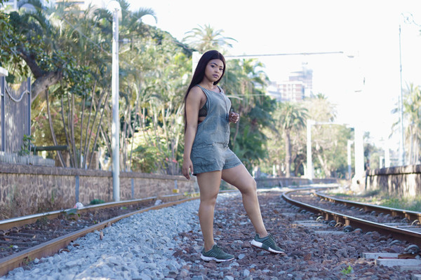 Premium Photo | Caucasian teenager posing near on railway track