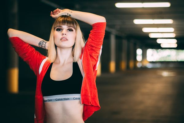 Free: Photo of Woman in Red Sports Bra 