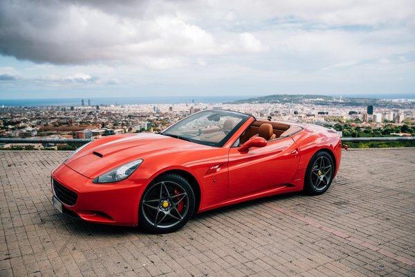  red,car,city,ferrari,luxury car,convertible, italian car