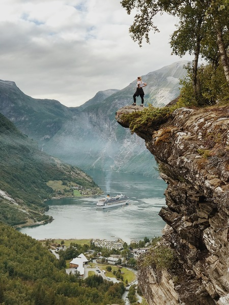 adventure,cliff,daylight,daytime,environment,landscape,mountains,nature,outdoors,person,river,rocks,scenic,ship,tourism,trees,water,Free Stock Photo