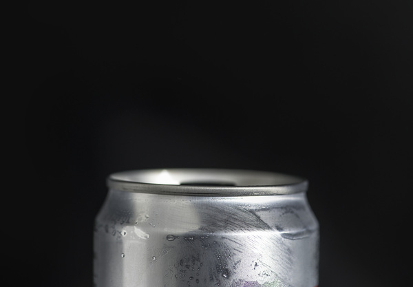 aluminum,beer,beverage,black background,can,chilled,close-up,cold,cold drink,dark,drink,metal,moisture,silver,soda can