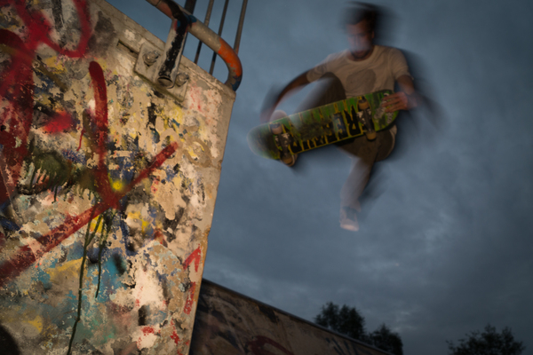 skateboarder,skateboarding,jump,tricks,graffiti,spray paint