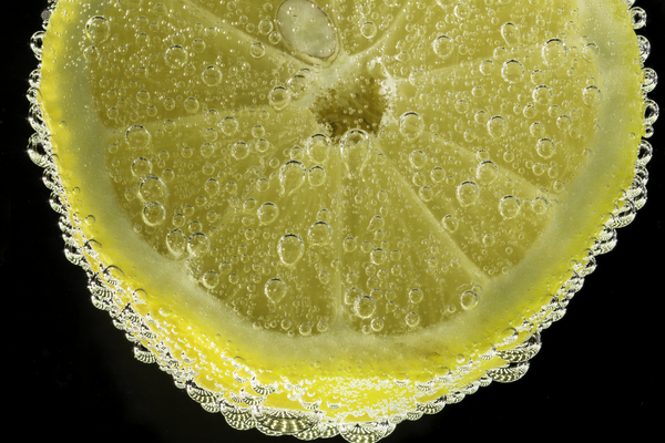 wet,water,slice,round out,round,liquid,lime,lemon,juicy,juice,healthy,h2o,fruit,fresh,colors,close-up,citrus fruit,citrus,bubbles,black background