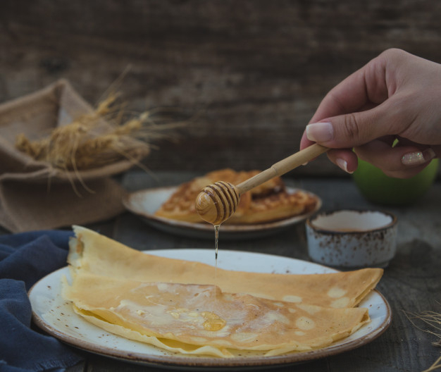 adding,tart,tasty,crepes,delicious,pastry,fat,sweet,decoration,honey,kitchen,woman,restaurant