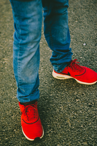 blue jeans,casual,colors,denim,fashion,footwear,jeans,legs,nike,outdoors,person,red,shoes,sneakers,style,wear