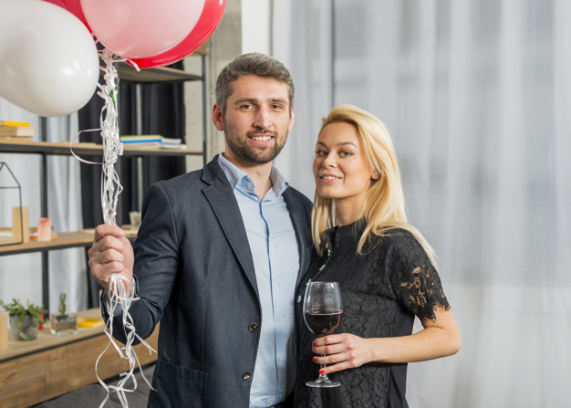 love,camera,man,home,wine,celebration,valentine,happy,furniture,balloon,event,room,couple,glass,drink,balloons,fun,alcohol,relax,romantic