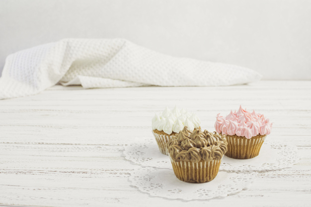 chocolate,cupcake,sweet,strawberry,dessert,group,cream,cupcakes,delicious,tasty,craving,buttercream,doilies