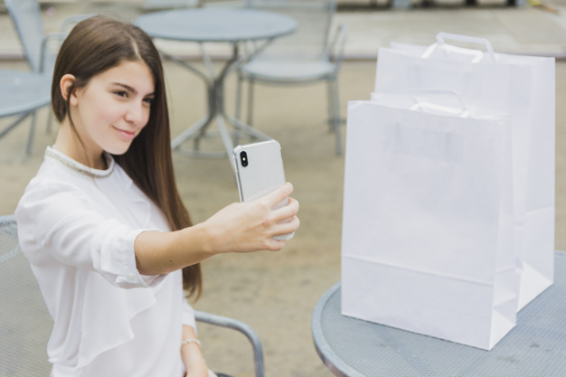 summer,camera,phone,box,table,shopping,mobile,face,cute,happy,cafe,bag,smartphone,person,white,street,shopping bag,chair,mobile phone