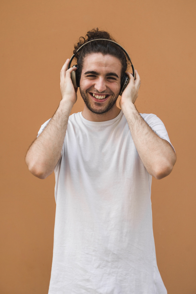 music,template,man,smile,happy,wall,person,boy,tshirt,headphones,audio,happiness,guy,listening,smiling