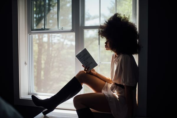 wall,flower,woman,reading,woman,book,eserp,woman,portrait,afro,reading,book,woman,windowsill,window,indoor,boot,style,fashion,model,black woman,public domain images