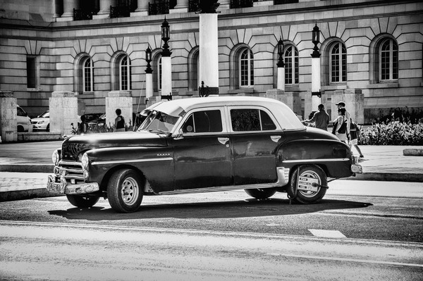 asphalt,automobile,black and white,building,car,chrome,classic,classic car,outdoors,pavement,people,road,shiny,street,transportation system,vehicle,vehicles,vintage,wheels,Free Stock Photo