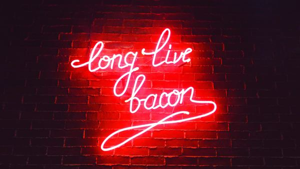 word,light,neon,signage,sign,typography,red,light,leafe,light,neon,lighting,wall,lettering,typography,words,long live bacon,glowing,red,bacon,brick
