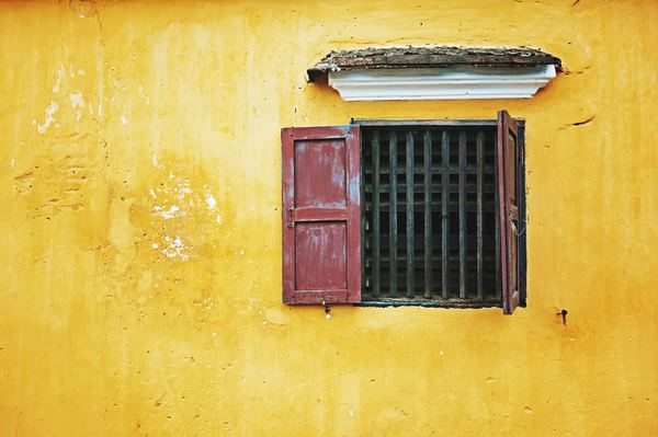indium,building,architecture,yellow,flower,road,kitchen,color,colorful,yellow,wall,window,red shutter,shutter,plaster,house,minimal,color,light,stucco,antique